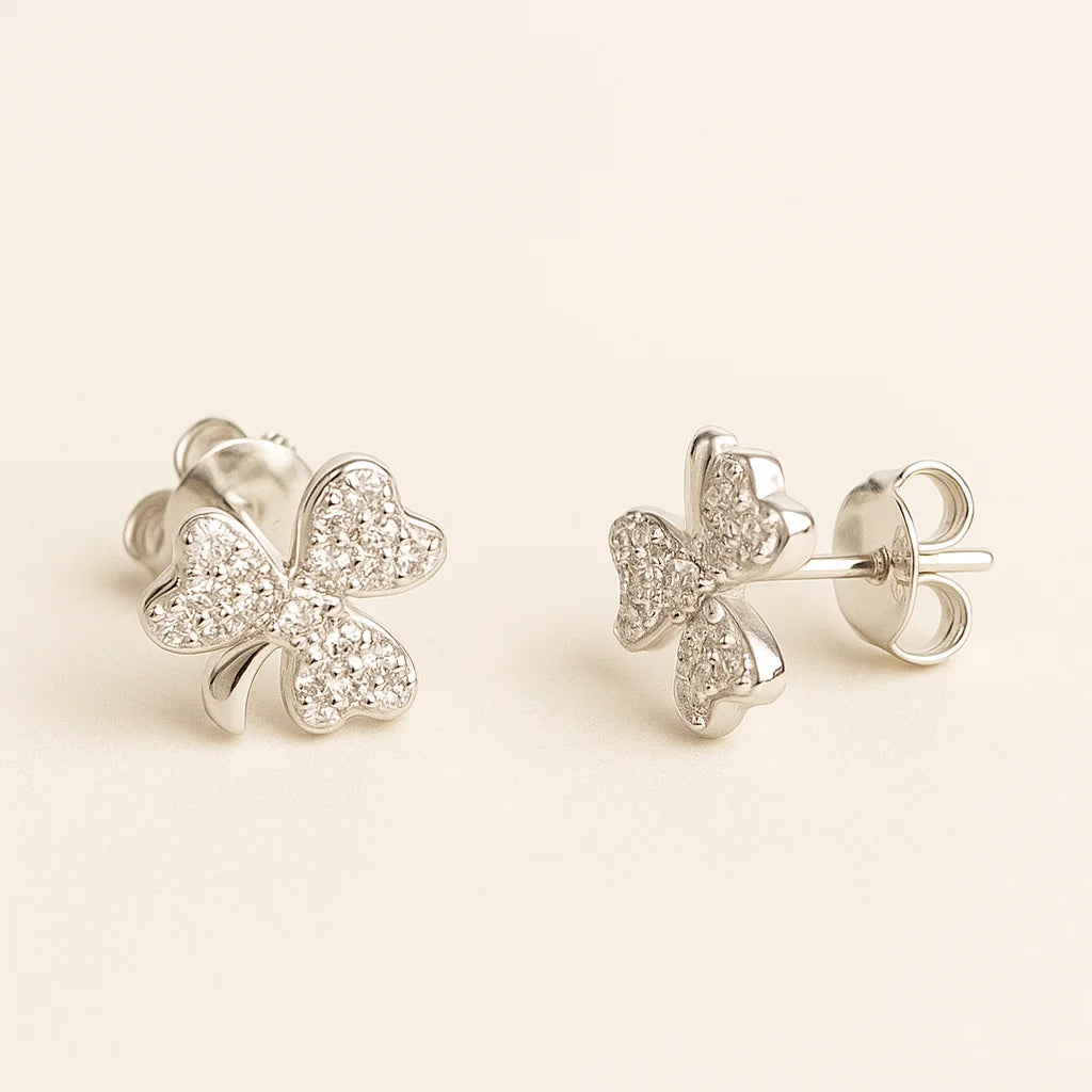 925 silver stud earrings in three‑leaf clover design with pave-style shimmering accents