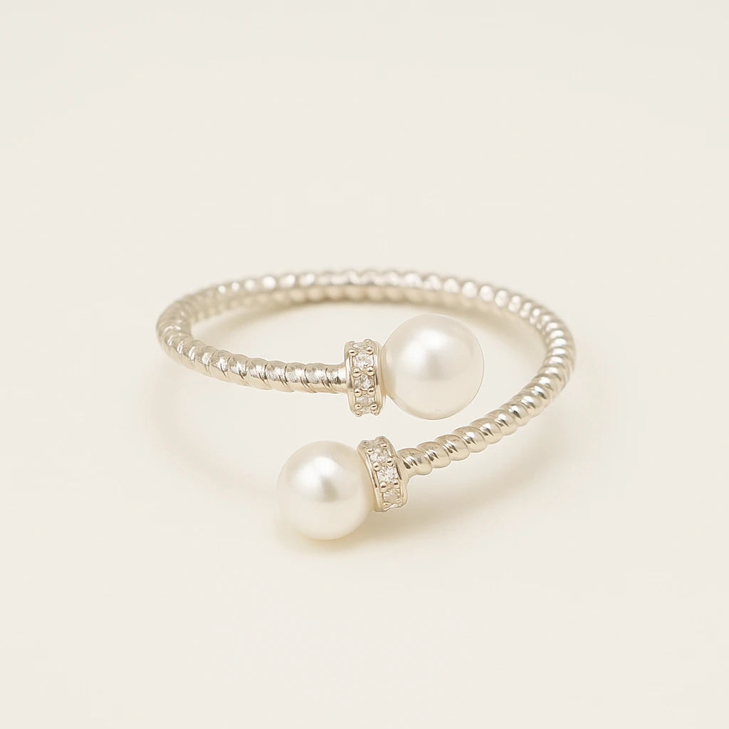 Pearl ring with a beige background