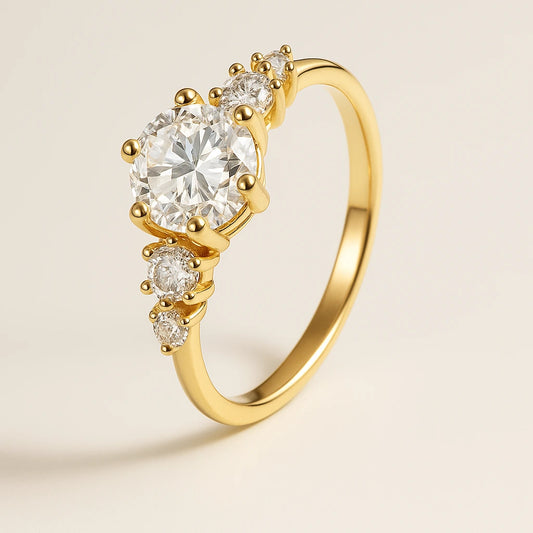 Gold plated ring with three diamonds on a beige background