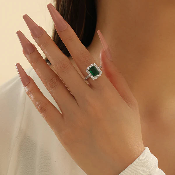 925 silver ring with deep green emerald-style stone in a bold unisex design