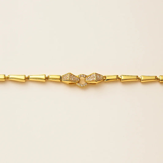 A gold-plated 925 sterling silver link bracelet with a sparkling cosmic bond-inspired centerpiece.