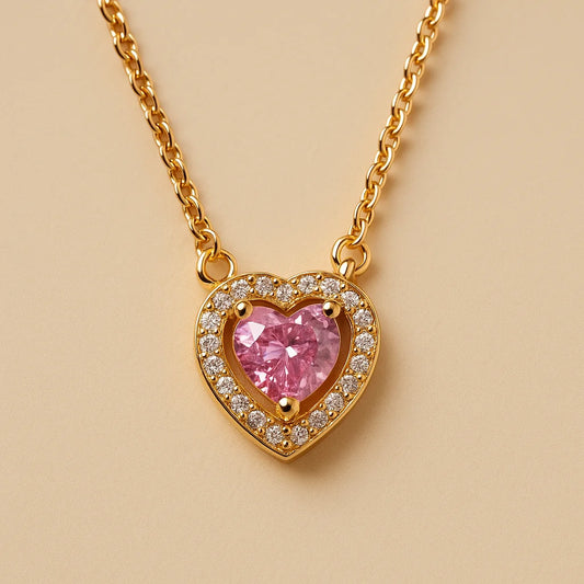 A 925 sterling silver and a gold-plated necklace, each with a heart-shaped stone and a sparkling pavé halo.