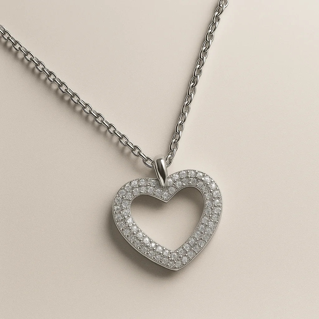 A 925 sterling silver and a gold-plated necklace, each with a heart-shaped pendant completely paved in sparkling cubic zirconia.