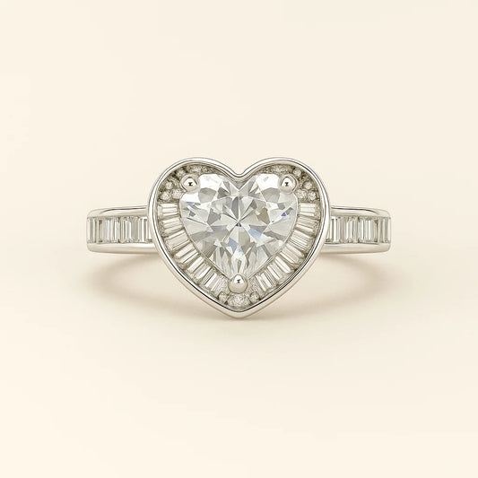 A 925 sterling silver ring with a central heart-shaped cubic zirconia stone, a pavé halo, and baguette-cut stones on the band.