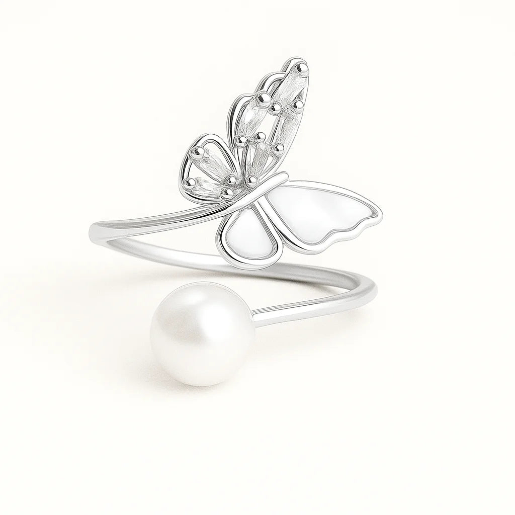 A 925 sterling silver and a gold-plated open-wrap ring with a butterfly centerpiece of mother-of-pearl and baguette cubic zirconia, and a pearl.