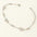 gold-plated heart charm bracelet featuring pavé-set heart charms with cubic zirconia stones on a delicate chain.