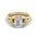 Lab grown diamond engagement ring in yellow gold, featuring an emerald cut diamond and side stones.