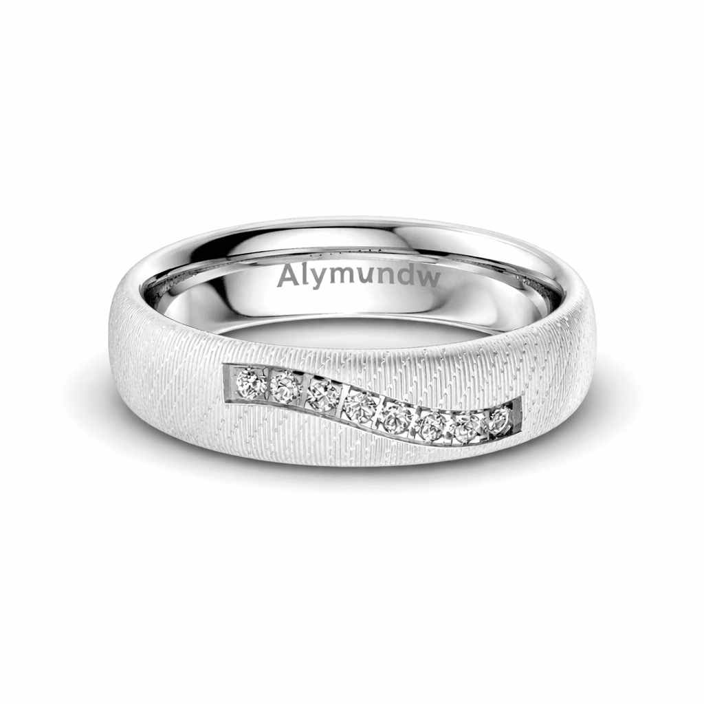 Luxury wedding rings from Alymwndw featuring a diamond-studded platinum band with a unique textured finish.