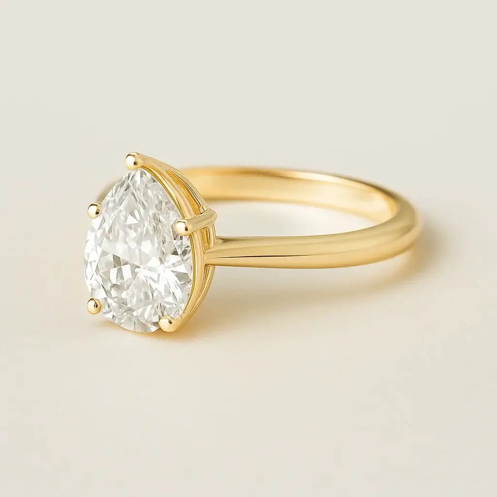 pear cut moissanite ring showcasing a 2.0 carat pear-shaped moissanite in gold-plated 925 silver setting.