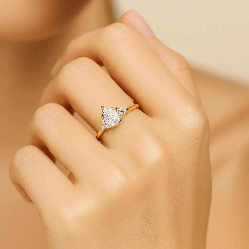Pear Radiance • 1.5 Carat Pear - Shaped Moissanite Ring in 925 Silver (Gold Finish) - Alymwndw