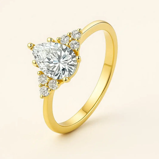 Pear Radiance • 1.5 Carat Pear - Shaped Moissanite Ring in 925 Silver (Gold Finish) - Alymwndw